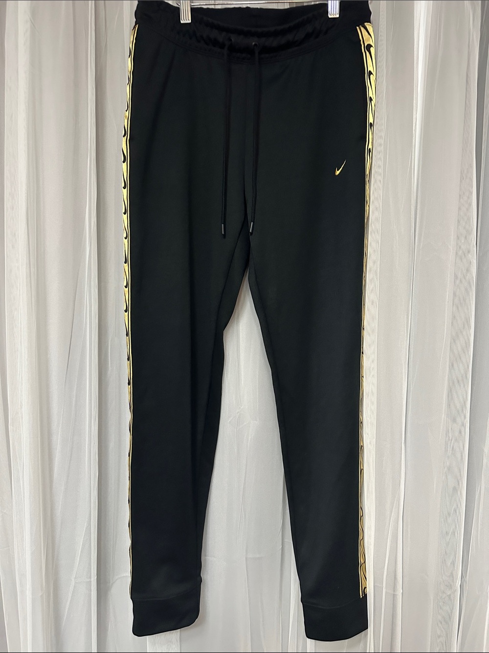 Nike Black Track Pants with Yellow Side Stripe